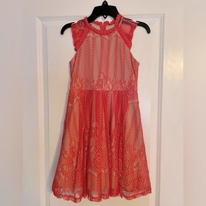 US Angels Coral fit and flair  dress with chrochet trim